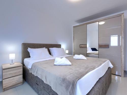 Voodi või voodid majutusasutuse Apartment Villa Amra-5 by Interhome toas