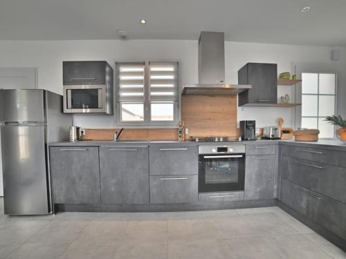 Η κουζίνα ή μικρή κουζίνα στο Holiday Home L'Instant Vert by Interhome