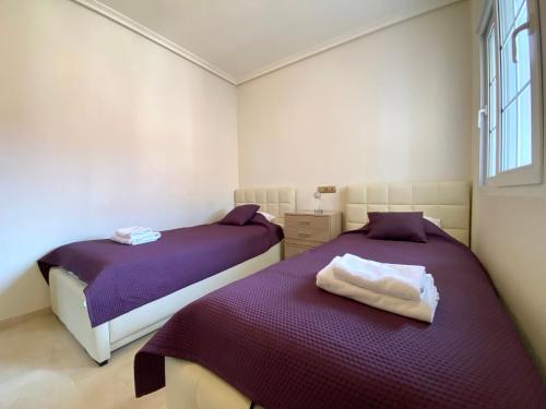 Postel nebo postele na pokoji v ubytování LA CALETA - LUXURY 3 BEDROOM SEA VIEW by Grupo Quattro