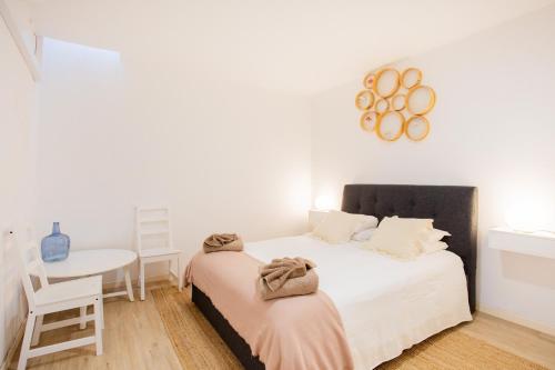 Ένα ή περισσότερα κρεβάτια σε δωμάτιο στο Casa Lugos