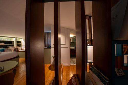 a view of a room with a living room at Giardini Penelope Resort e Spa in Ciampino