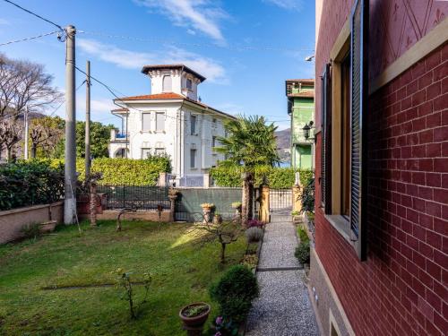 a view of a house from a window at Holiday Home Valentina by Interhome in Porto Ceresio