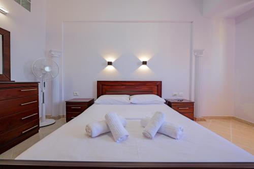 Ένα ή περισσότερα κρεβάτια σε δωμάτιο στο Valentina Apartment 2