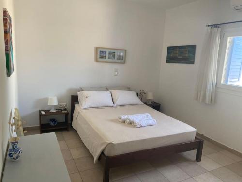 Postel nebo postele na pokoji v ubytování Cycladic home in Kounados Paros