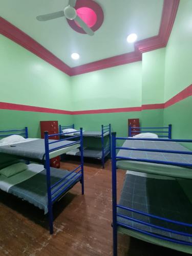 Cama o camas de una habitación en Hostal Amigo
