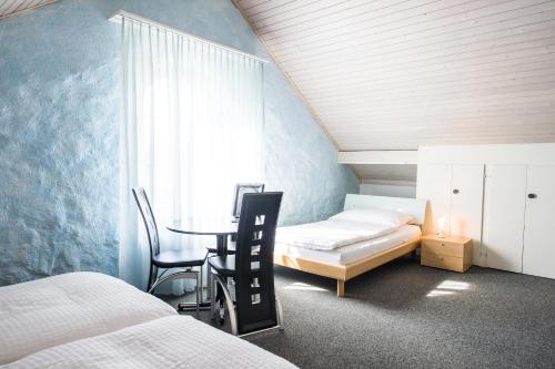 Postel nebo postele na pokoji v ubytování Hotel Sternen