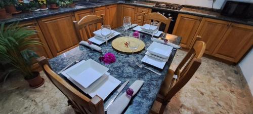 an overhead view of a dining table in a kitchen at The Palm Villa in St Paul's Bay