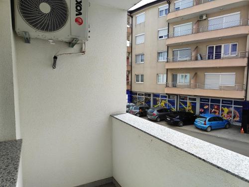 a room with a air conditioner on the side of a building at Apartmani Sanja in Teslić