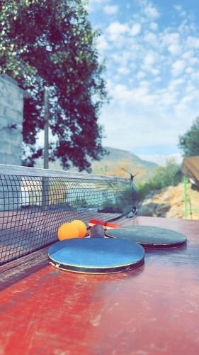 two surfboards sitting on top of a table at PINETOP RESORT in Khanpur