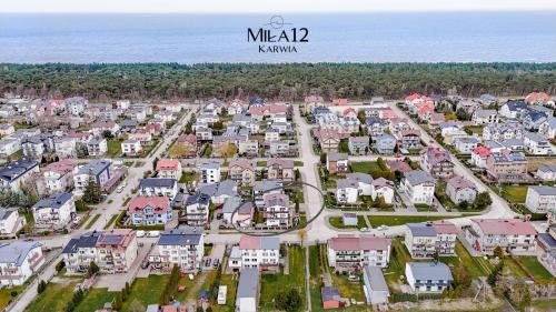 Miła 12 - Kameralne Pokoje 300 m od Plaży w Karwi