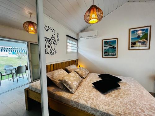 Postel nebo postele na pokoji v ubytování Le BÔ Bungalow - seaside luxury accommodation