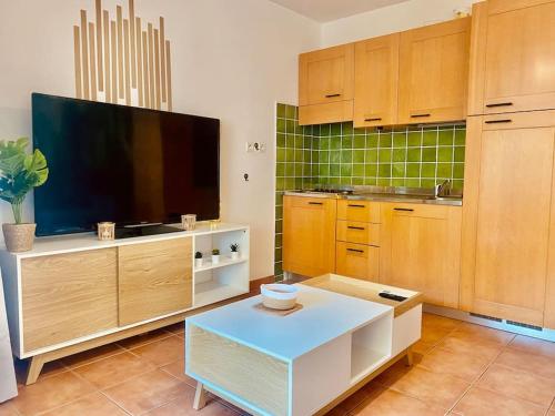 Kuchyň nebo kuchyňský kout v ubytování Appartement en bord de mer avec piscine