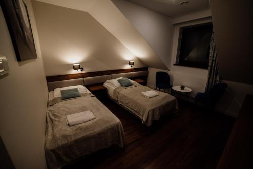 Katil atau katil-katil dalam bilik di Ranczo Czerwony Młyn