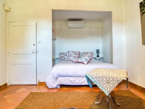 Ένα ή περισσότερα κρεβάτια σε δωμάτιο στο Holiday Home La Bastide de Magdeleine by Interhome