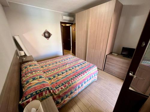 Postel nebo postele na pokoji v ubytování Casa Alessandro By La Via Del Mare Viaggi e Vacanze