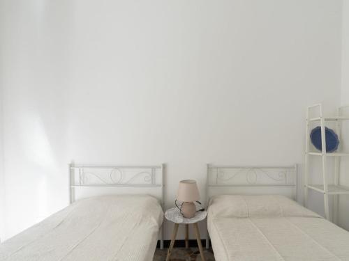 Apartment Central Home Carlotta by Interhomeにあるベッド