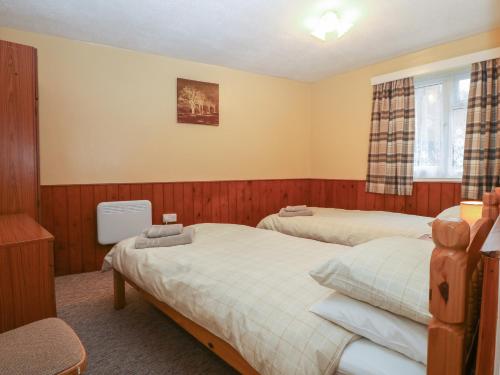 Ένα ή περισσότερα κρεβάτια σε δωμάτιο στο Ground Floor Apartment