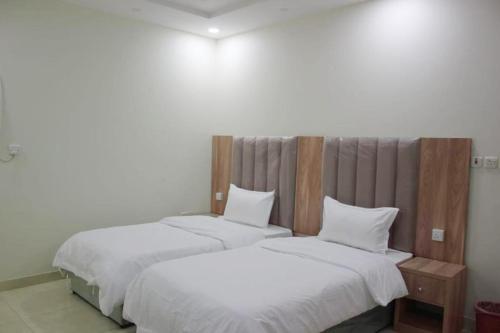 Krevet ili kreveti u jedinici u okviru objekta دار الكيان للشقق المخدومة - Dar Al Kayan Serviced Apartments