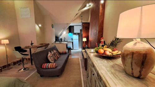 Ruang duduk di COSY STUDIO-LOFT climatisé