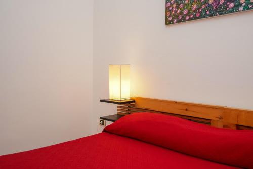 Postel nebo postele na pokoji v ubytování RESIDENCE LUPIAE