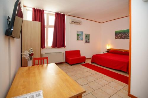 TV a/nebo společenská místnost v ubytování RESIDENCE LUPIAE