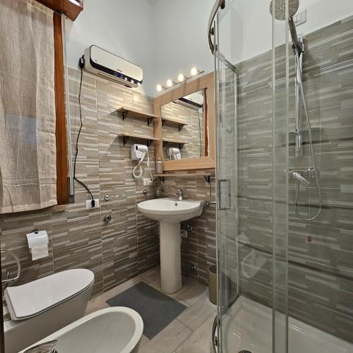 Koupelna v ubytování Corteantica RHO-FIERA by Rhospitality