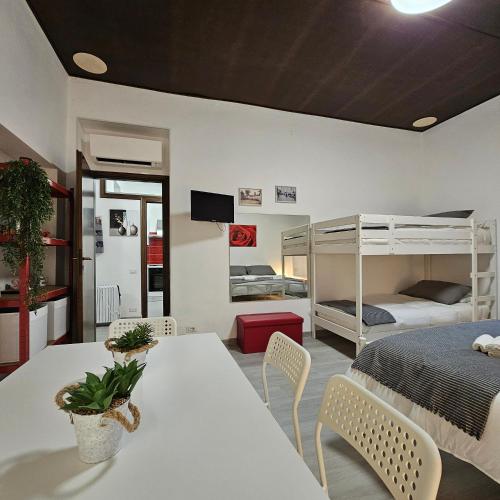 Postel nebo postele na pokoji v ubytování Corteantica RHO-FIERA by Rhospitality