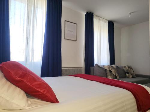 Ένα ή περισσότερα κρεβάτια σε δωμάτιο στο Appartement de charme