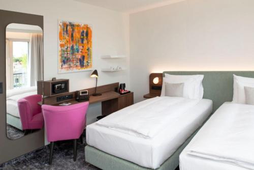 Cama o camas de una habitación en Hotel Le Parc