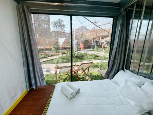 Postel nebo postele na pokoji v ubytování Pupa House - Capsule Hotel - Adults Only