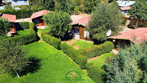 an aerial view of a house with a yard at Cabañas Buenavista Quillón in Quillón