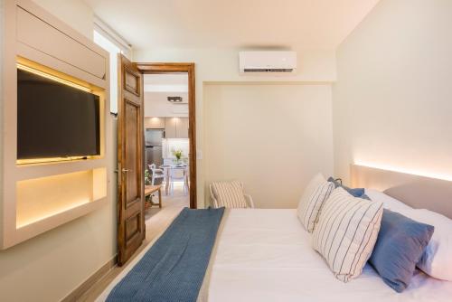 Ένα ή περισσότερα κρεβάτια σε δωμάτιο στο UPOINT Floors