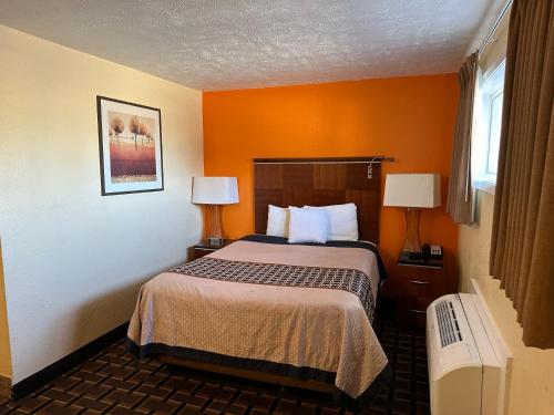 A bed or beds in a room at Comfort stay inn