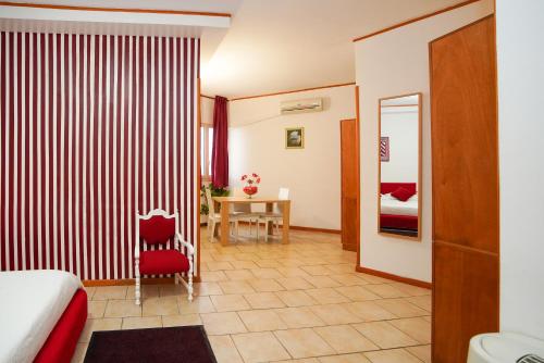 Postel nebo postele na pokoji v ubytování RESIDENCE LUPIAE