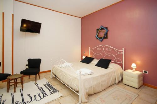 Postel nebo postele na pokoji v ubytování RESIDENCE LUPIAE