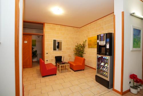 TV a/nebo společenská místnost v ubytování RESIDENCE LUPIAE