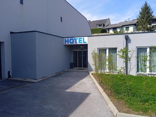 a hotel sign on the side of a building at Sporthotel Ferlach in Ferlach