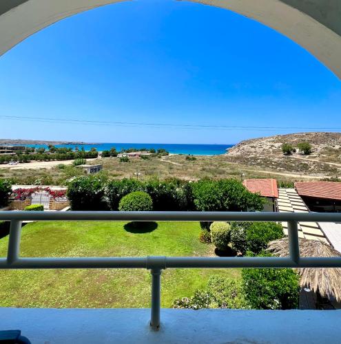 a view of the ocean from a balcony at Karteros Hotel in Karteros