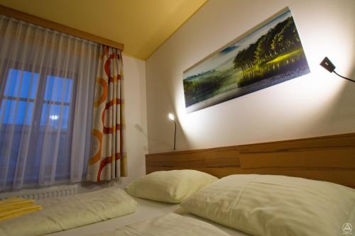 Postel nebo postele na pokoji v ubytování Egidiwirt Murau