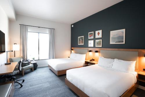 Ένα ή περισσότερα κρεβάτια σε δωμάτιο στο Bridge Creek Inn