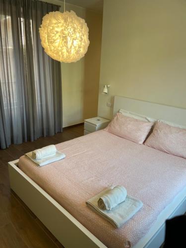 Appartamento "Da Maddalena" tesisinde bir odada yatak veya yataklar