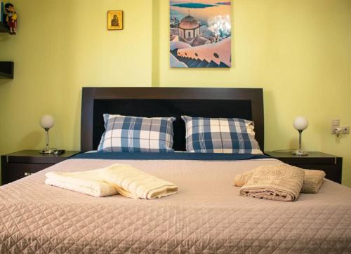 Villa Popi Gouves & Spa tesisinde bir odada yatak veya yataklar