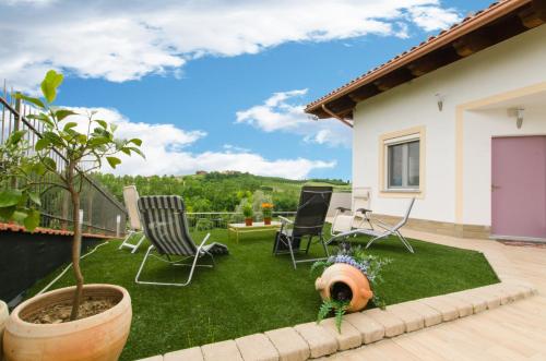 Κήπος έξω από το Wellness Suite Na' Canuna'