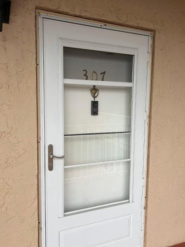 a door with the number thirtyseven on it at Bayshore Yatch Tennis Condo 2br 3 beds, Walking Distance to Beautiful Quite Beach in Clearwater Beach