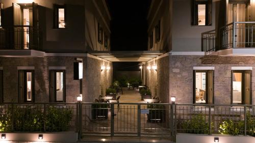 a hallway of a building at night at Akti Vigla Apartments in Mytilini