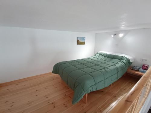 Ένα ή περισσότερα κρεβάτια σε δωμάτιο στο Tinos youth apartment