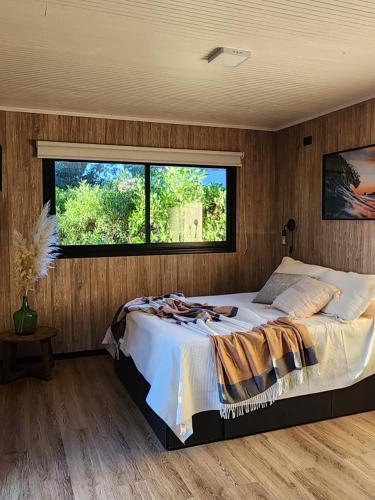 En eller flere senge i et værelse på Casa de playa Casamigos Miramar