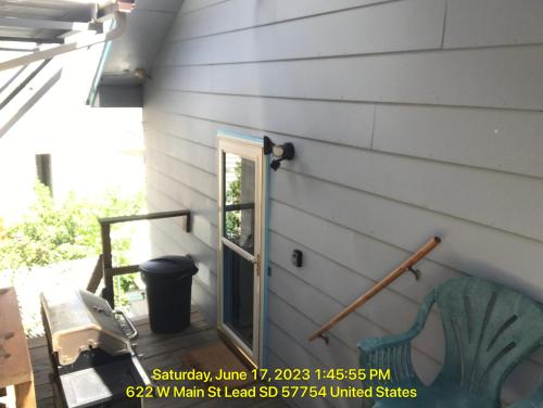 a door on the side of a house at West Main Lodge, 3 bedroom in Lead