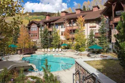 The swimming pool at or close to Ski In-Out Hot Tub Gym Sauna Pool Reserved Parking -501