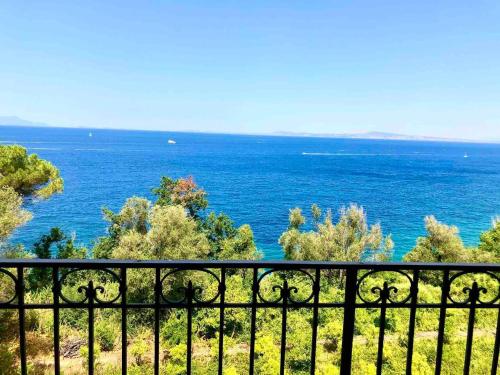 a view of the ocean from a balcony at Spacious apartment with sea view in Massa Lubrense in Massa Lubrense